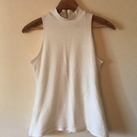 white high neck sleeveless top